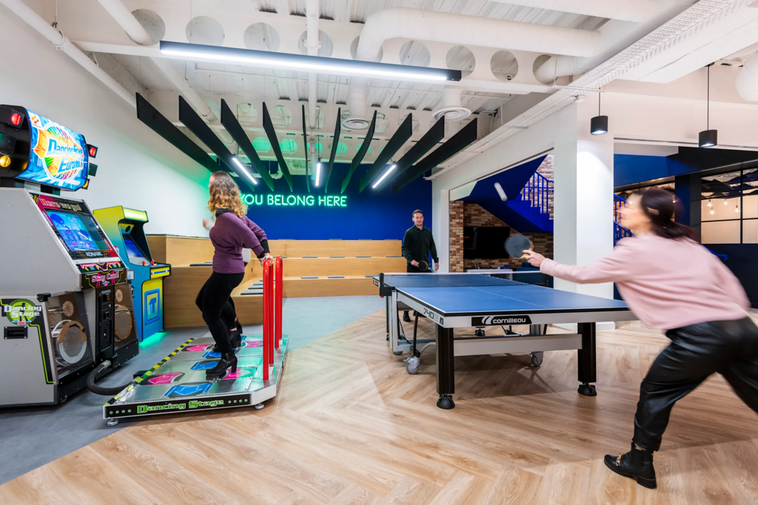 a recreational area in a hybrid office space at iTech Media playing games
