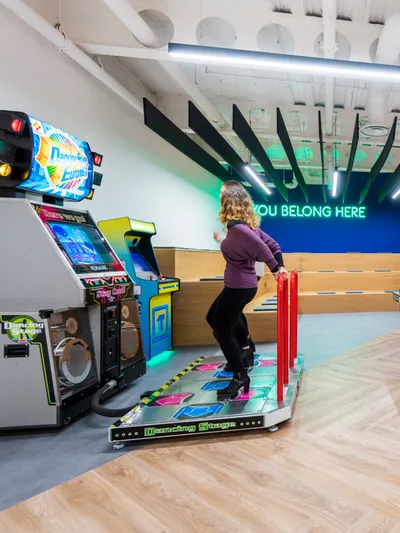 a recreational area in a hybrid office space at iTech Media playing games
