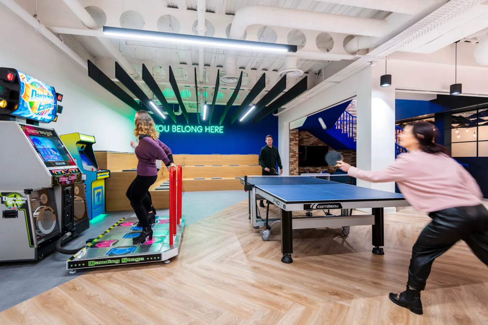 a recreational area in a hybrid office space at iTech Media playing games