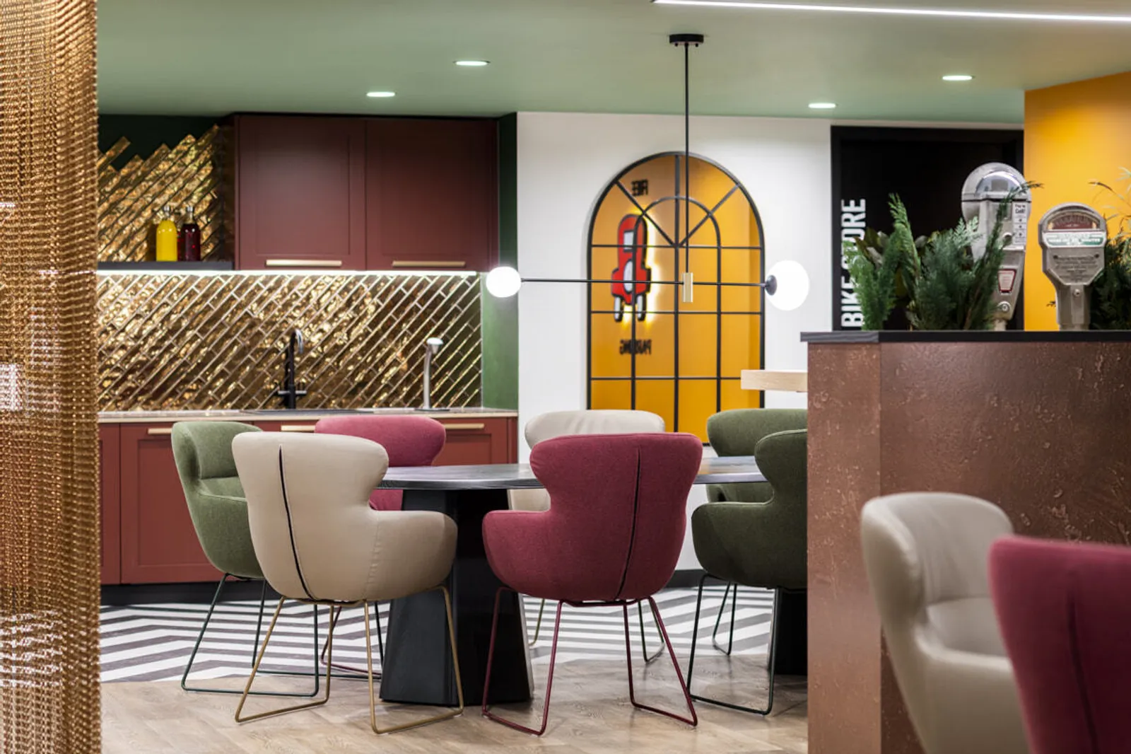 Cozy, colourful social office space, casual meeting area