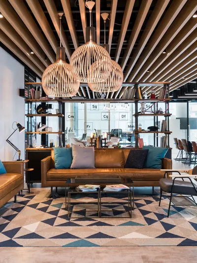 a cat b fit out showing a fully fitted office with lighting, furniture and plants