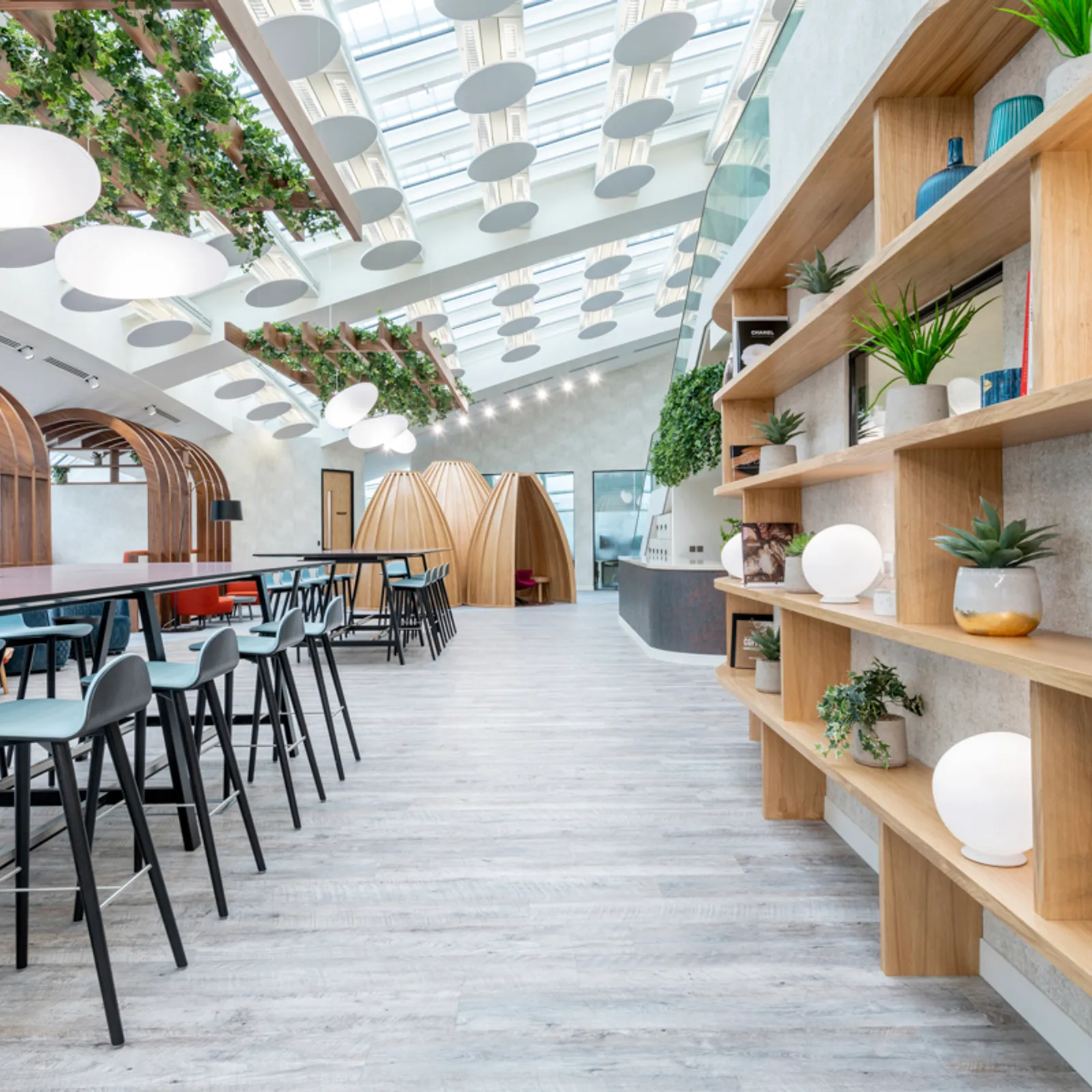 a modern office fit out with high seating and sustainable design elements