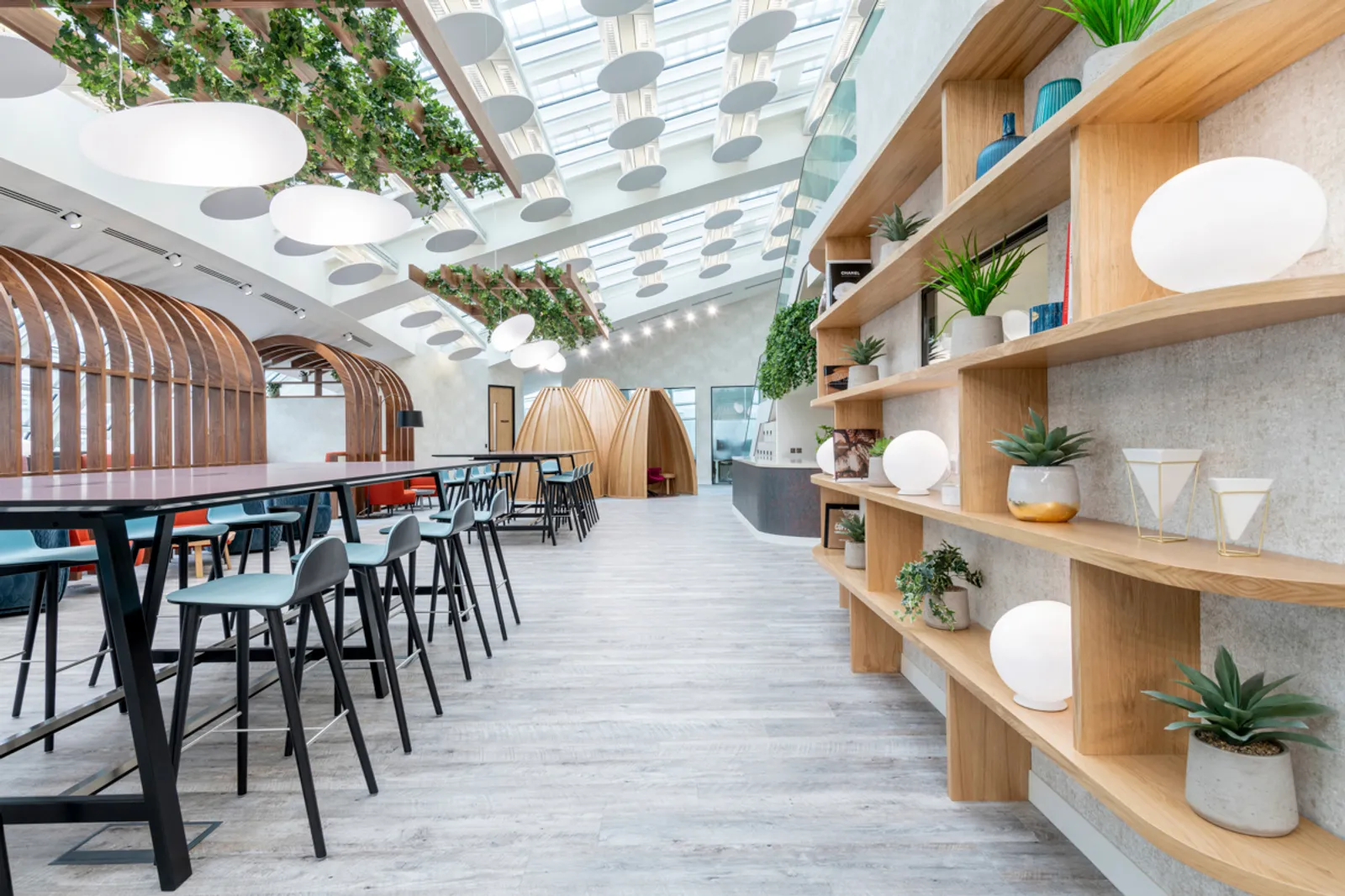 a modern office fit out with high seating and sustainable design elements