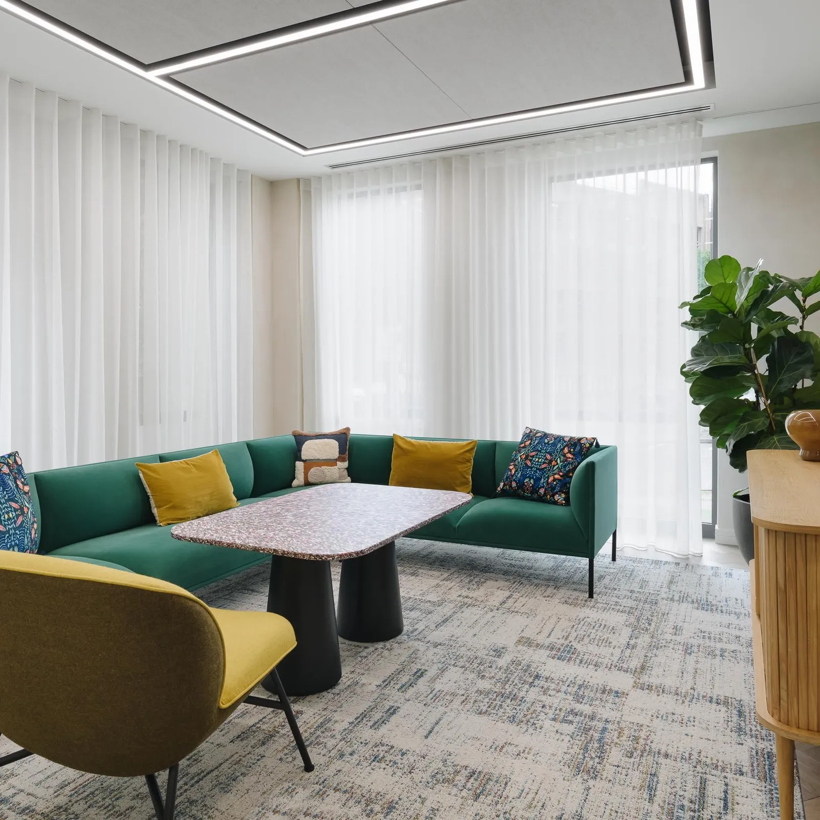 a room with chairs and sustainable furniture