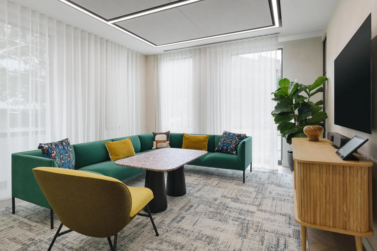 a room with chairs and sustainable furniture