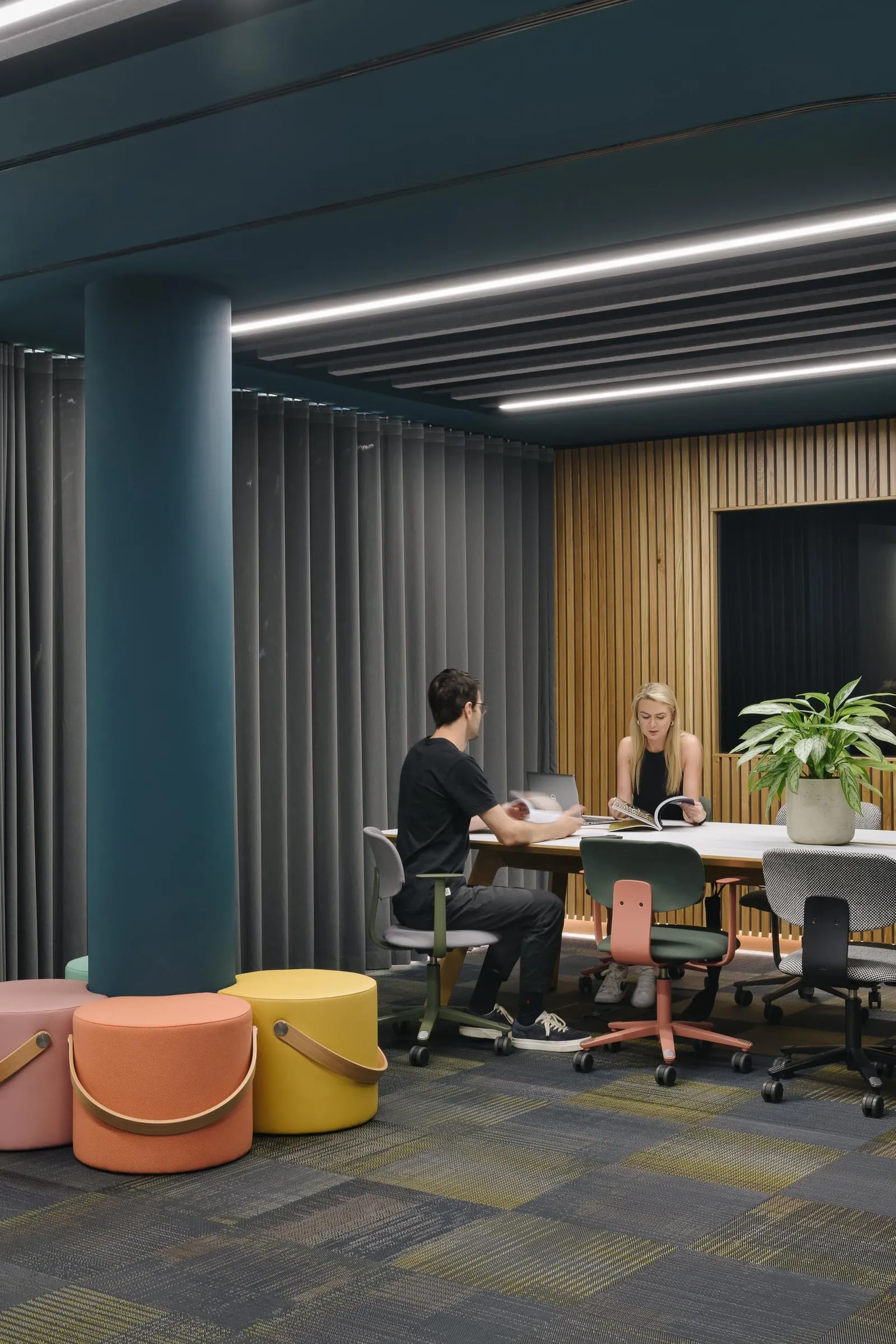 two people working in an office on sustainable furniture